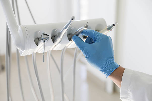 Professional Wisdom Tooth Removal technician working in Enochville, NC